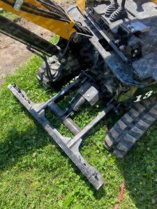 S3E 1-ton excavator with attachments on grass
