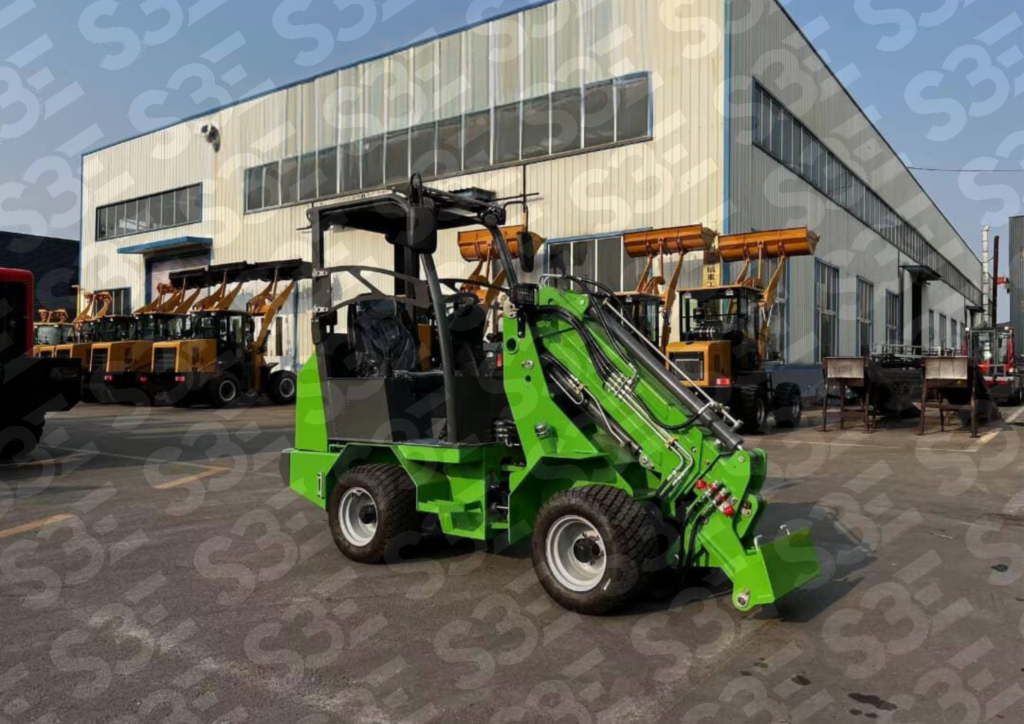 S3E green tree loader parked in front of our manufacturing facility