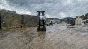 S3E yellow forklift parked outside a warehouse